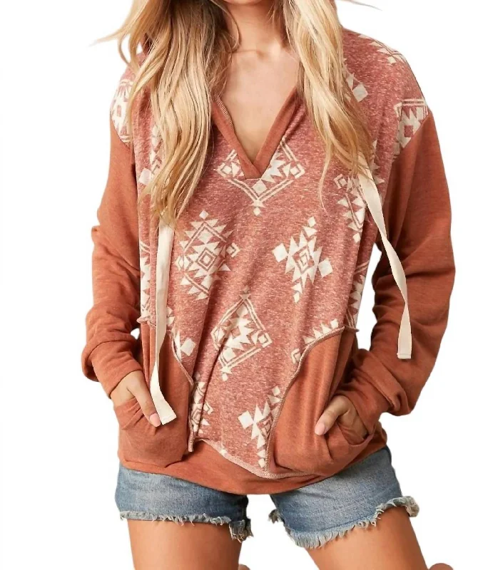 Trendy Women's Apparel for All Seasons Aztec Vneck Hoodie In Rust